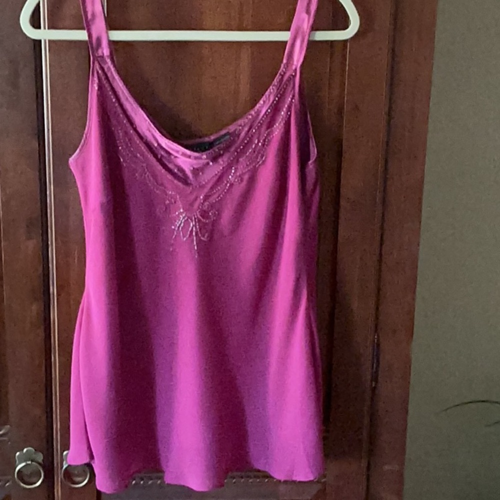 Beautiful beaded top, sheer outside with satin lining. Size L